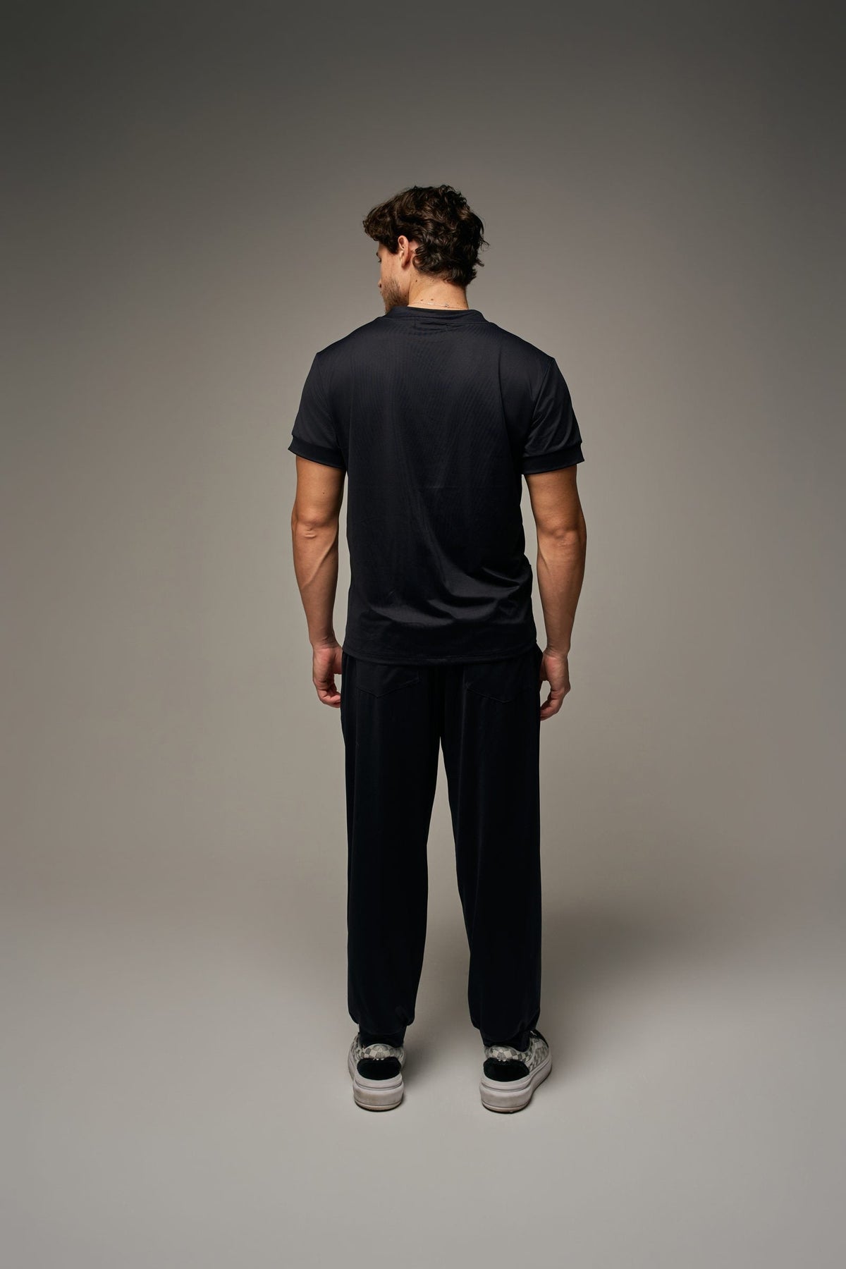 Scrub Flow Masculino Preto, costas